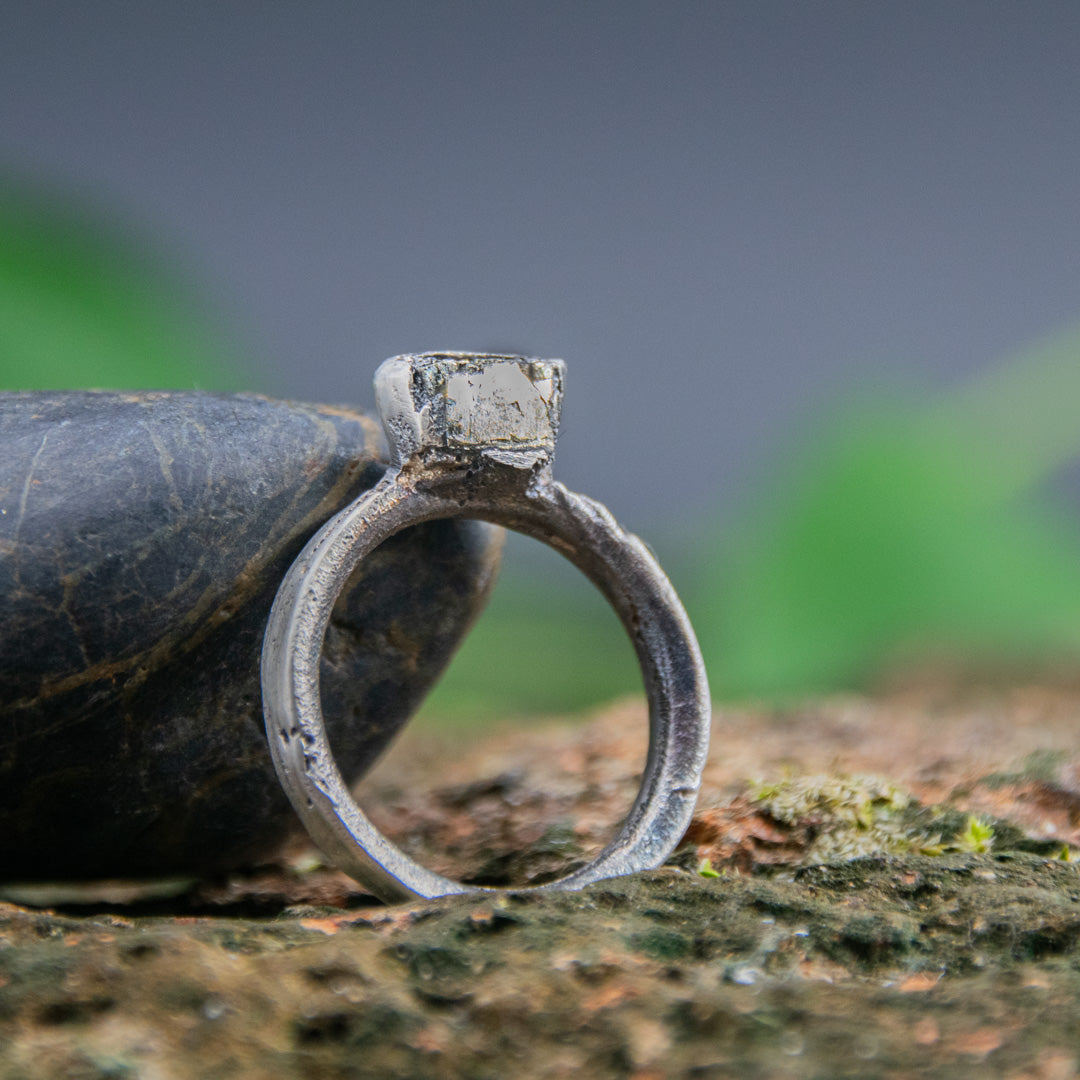 Unique pyrite gemstone ring showcasing organic textures from sand casting technique.