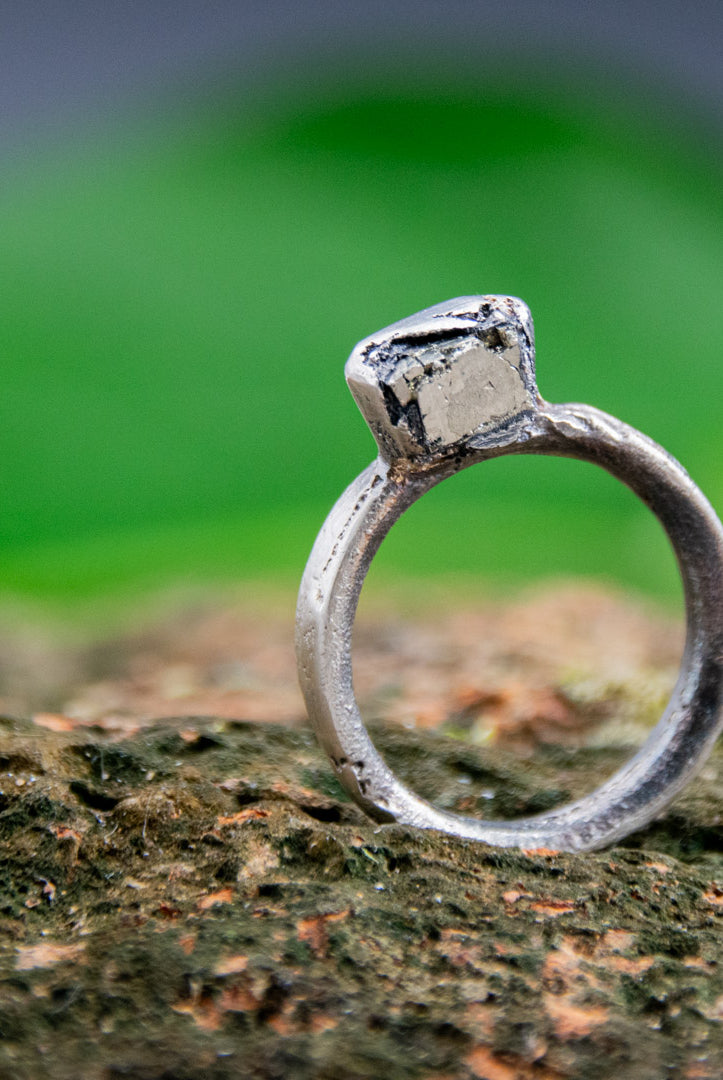 Unique Pyrite Gestone Ring with organic textures, showcasing artisanal sand casting craftsmanship.