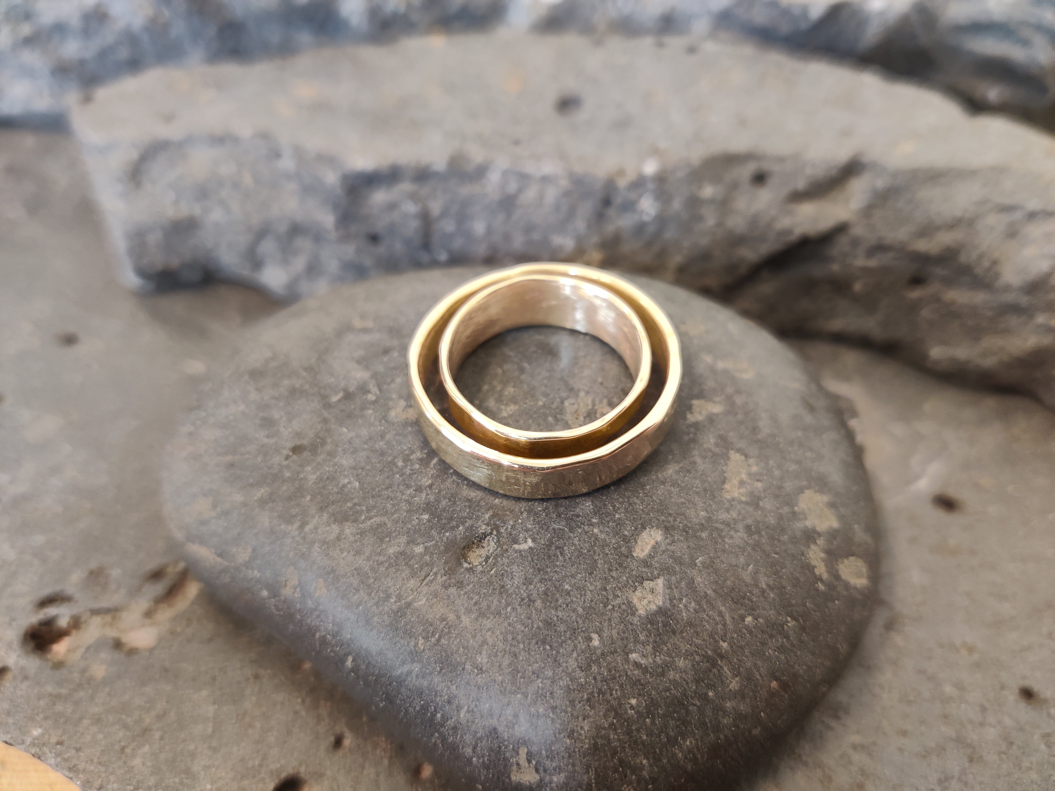 Finished gold wedding hammered bands, crafted in Koh Chang jewelry studio. and workshops for couples, thailand